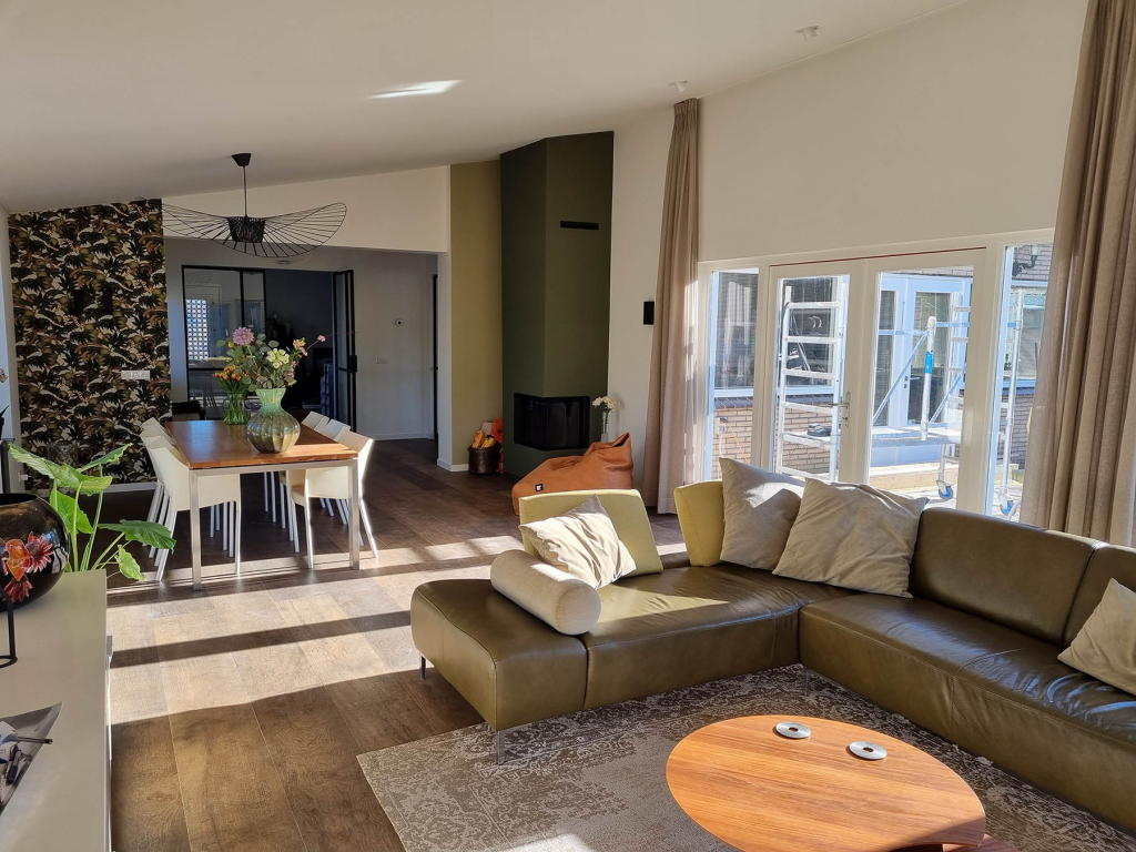 Warp underfloor heating system installed in a living room