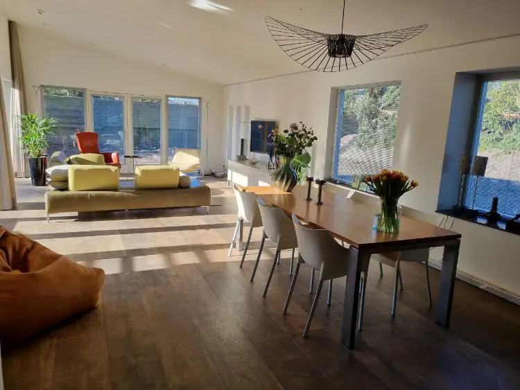 Warp underfloor heating system installed in a living room