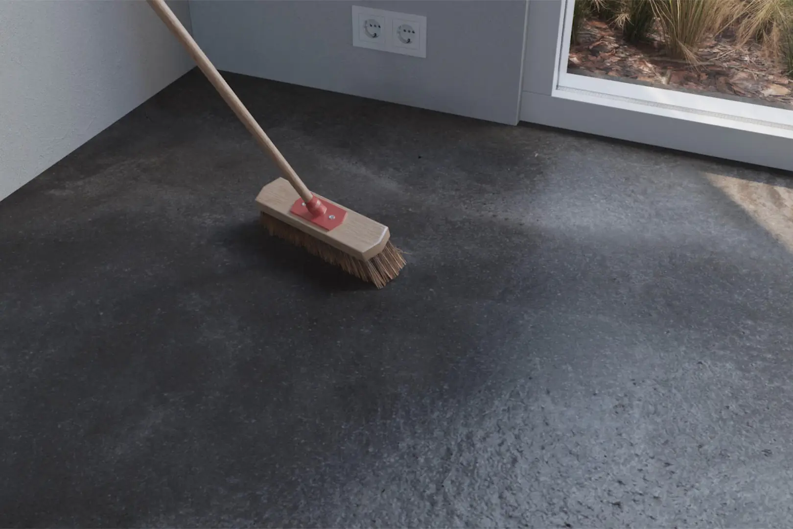Broom cleaning a Wooden/Concrete subfloor.