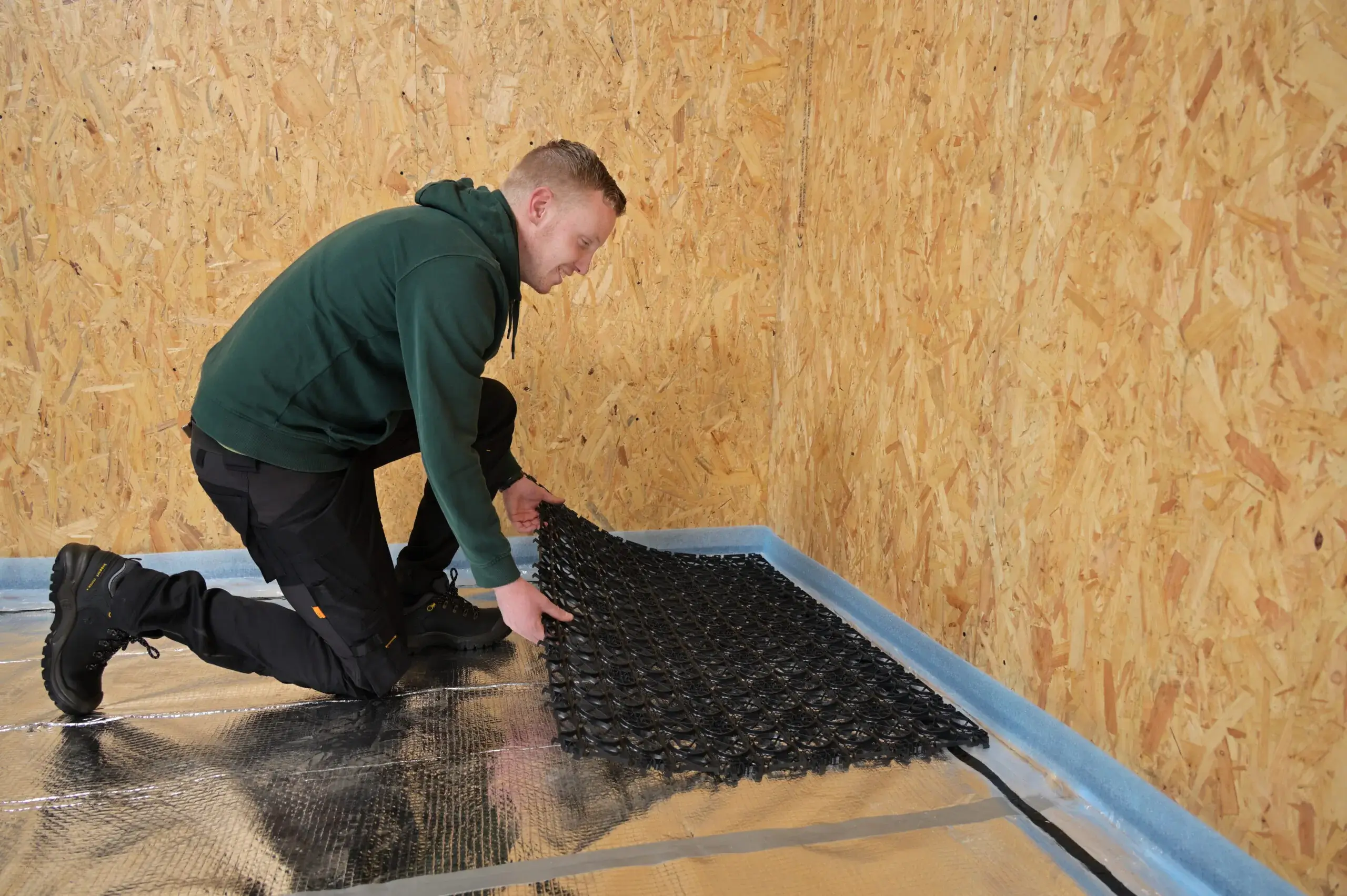 Speetile mat system being laid down.
